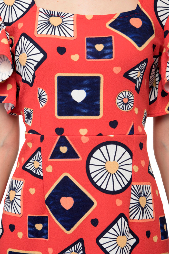 Sleeveless ruffle hem mini dress with heart prints