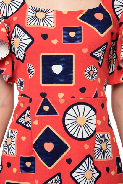 Sleeveless ruffle hem mini dress with heart prints