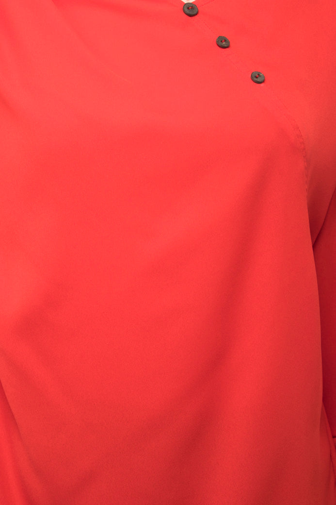 Plain red ruffle trim side button top