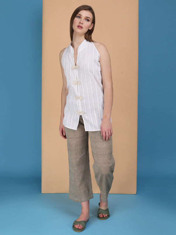 Micro pintucks stand collar sleeveless top with handcrafted buttons Made in cotton poplin