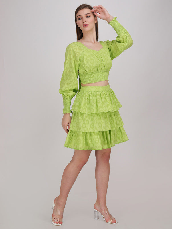 neon green crop top with tier panel short skirt