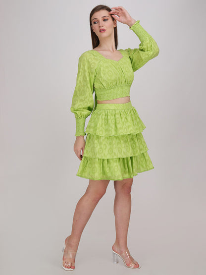 neon green crop top with tier panel short skirt