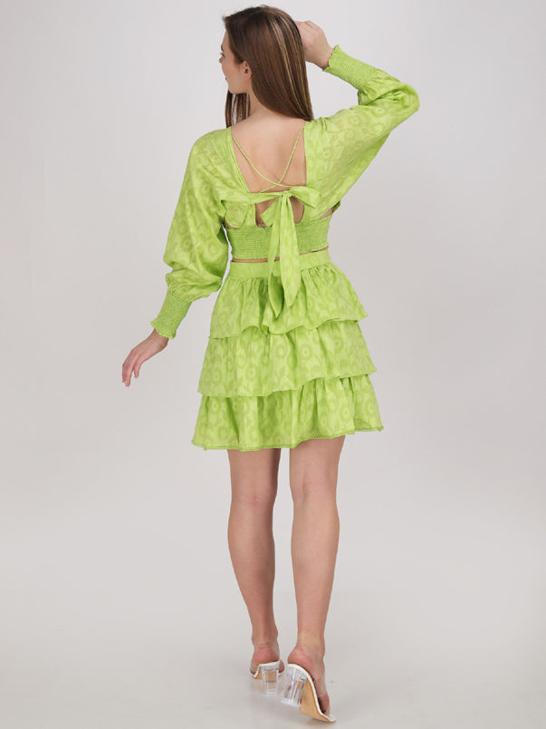 neon green crop top with tier panel short skirt