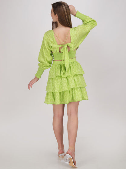 neon green crop top with tier panel short skirt
