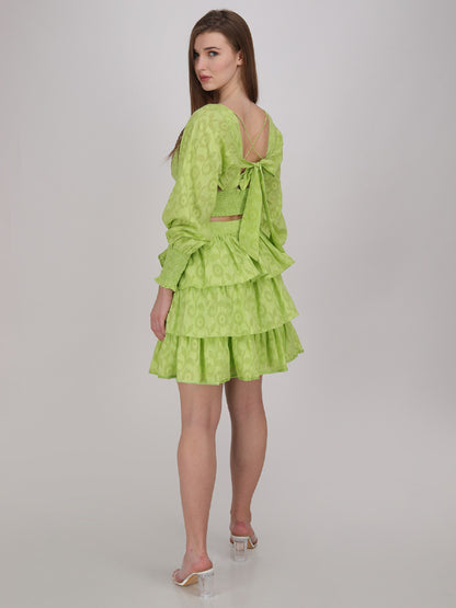 neon green crop top with tier panel short skirt