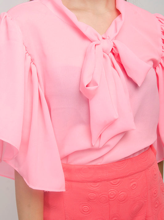 Batwing sleeve top with a long tie paired